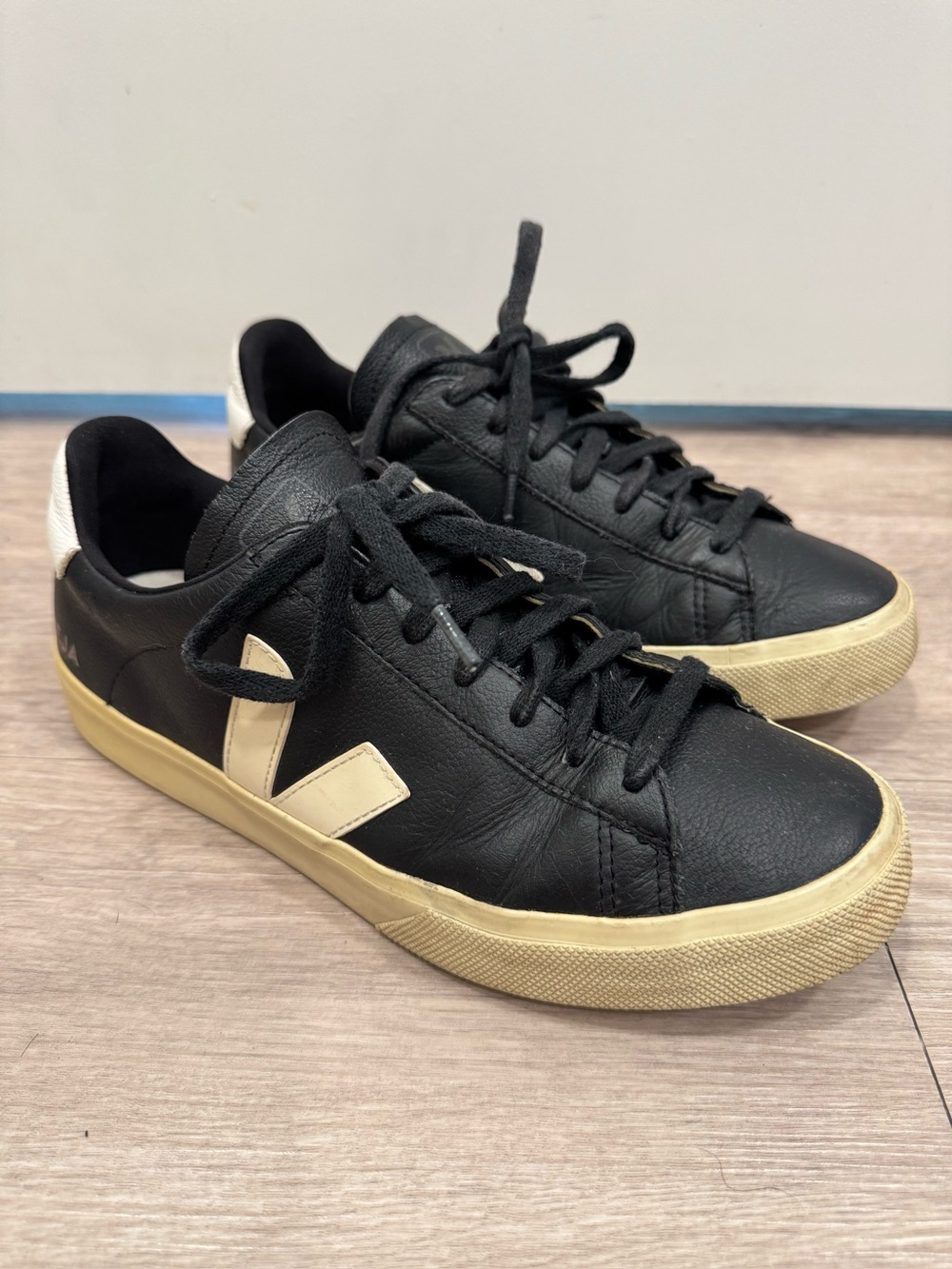 Veja Campo sneakers in a black leather finish with a white logo